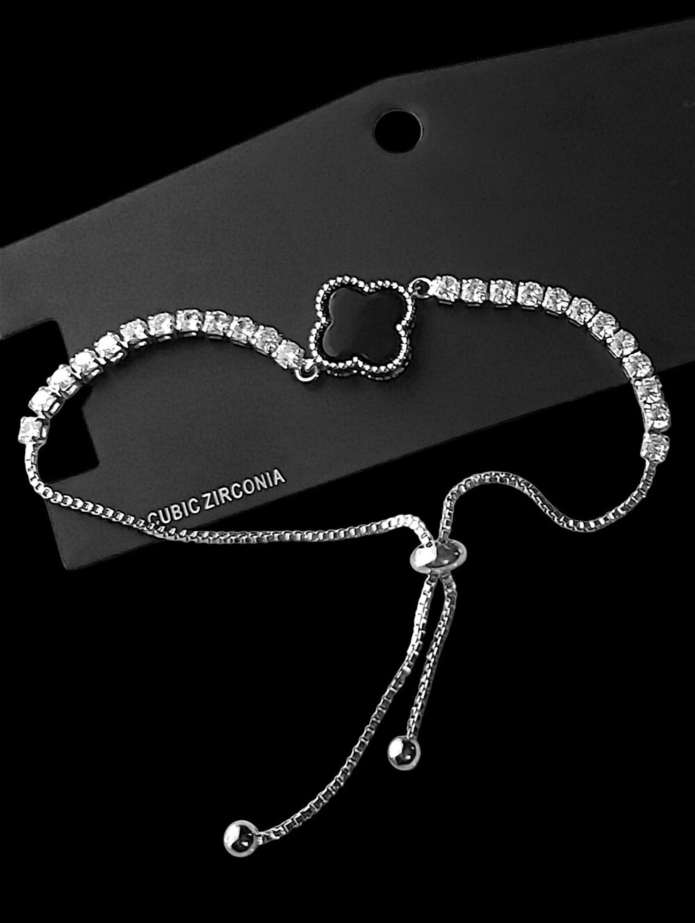 Cubic Zirconia with Clover Motif - Slider Tennis Bracelet, Bolo Clasp